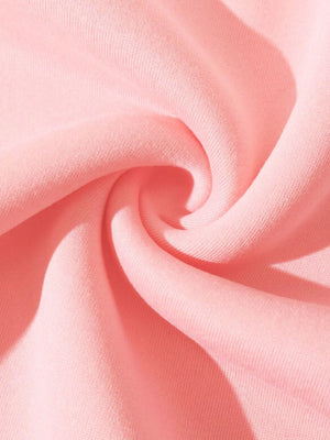 Blush pink acrylic hoodie with adjustable hood and soft fabric texture.