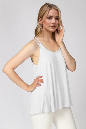 White double strap trapeze cami with a relaxed fit and scoop neckline.