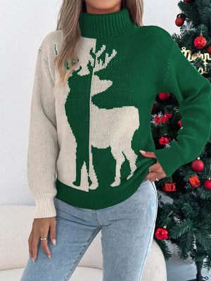 Green and cream knit turtleneck sweater with reindeer graphic, long sleeves, and ribbed trim.