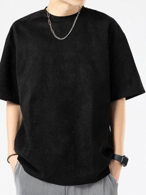 Men's black oversized cotton t-shirt with a crew neck and short sleeves.