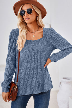 Dusty blue ribbed square neck top with puffed sleeves and a relaxed fit.