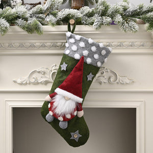 Green holiday stocking with gnome applique, gray polka dot cuff, and star details.