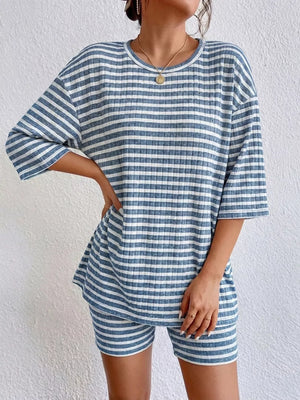Blue striped two-piece set with elbow sleeve top and shorts.