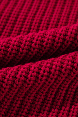Deep red acrylic knit sweater with ribbed texture detail