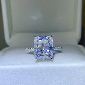Radiant cut moissanite ring with pavé band in silver