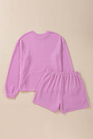 Ribbed knit matching set in Moonlit Mauve with long sleeves and elastic waist shorts.