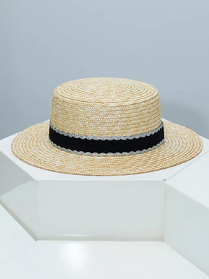 Straw boater hat with black and silver decorative band