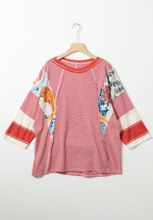 Patchwork stripe raglan sleeve tee in red with colorful boho print panels and contrast sleeves.