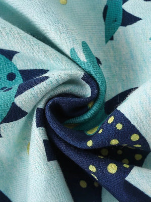 Turquoise baby sweatshirt with a fun dinosaur print and yellow polka dots.