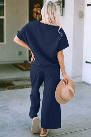 Dark blue textured knit tee and wide leg pants set with short sleeves and crew neck.