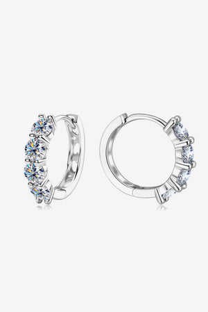 Silver pavé crystal huggie earrings with multiple round cut stones.