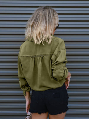 Cropped utility shirt in matcha green cotton with drawstring waist detail and button-down front.