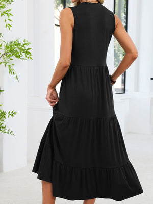 Black tiered midi dress with sleeveless design and ruffled hem.