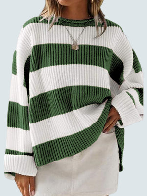 Striped oversized knit sweater in dark green and white with crew neck and long sleeves.