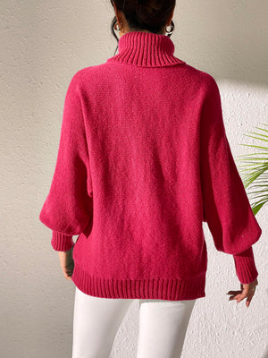Balloon sleeve turtleneck sweater in Deep Red knit with ribbed cuffs and hem.