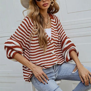 Wide stripe button-up knit cardigan in chestnut and white with wide sleeves.