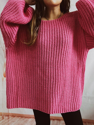Hot Pink oversized ribbed knit sweater with crew neck and long sleeves.
