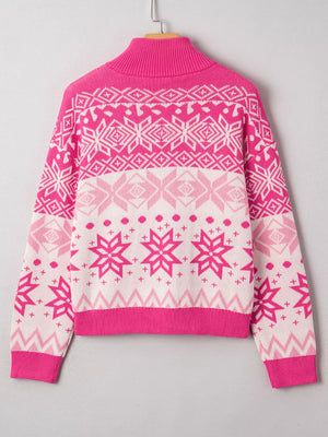 Women's pink Fair Isle knit quarter zip sweater with snowflake pattern.