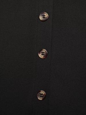 Black midi skirt with tortoise shell button front detail