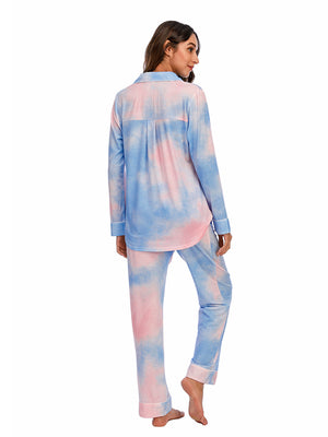 Pajama set with tie-dye pattern in pink and blue, piped trim, and button-up shirt.