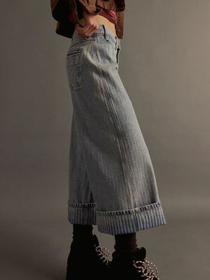 Light blue cotton blend high-waisted cropped jeans with wide legs and cuffed hems.