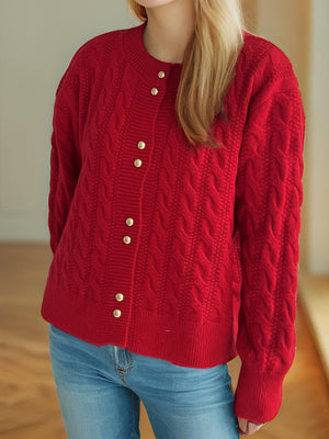 Deep Red cable knit cardigan with puff sleeves and gold buttons.