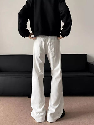 Essential Oversized Wide-leg Sweatpants in white with a relaxed fit and two back pockets.