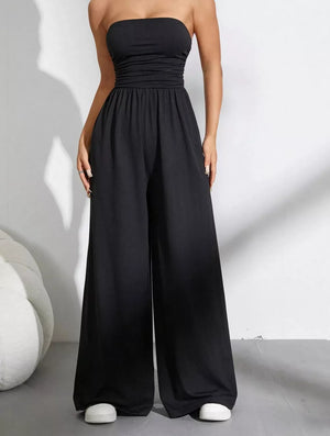 Black strapless tube top romper with ruched bodice and wide-leg pants