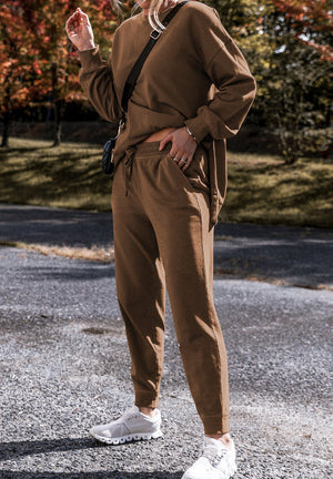 Relaxed fit coffee brown loungewear set with drawstring waist joggers and side slit sweatshirt.