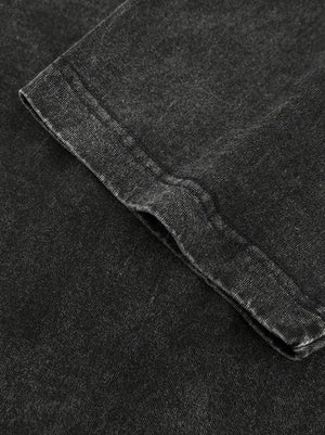 Acid wash oversized crew neck tee in Washed Black showing textured fabric detail.