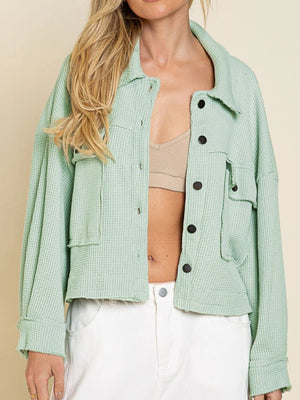 Mint green waffle knit cropped utility jacket with button front and chest pockets.