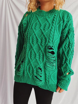 Green distressed cable knit sweater with ripped details and crew neck.