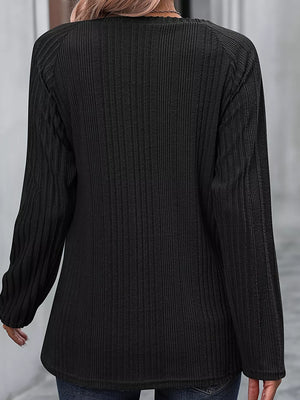 Ribbed Long Sleeve T-shirt With Button Detail in Black, model styling view