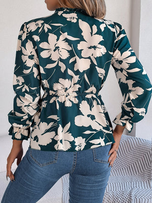 Deep Teal floral peplum blouse with ruffled neck and cinched waist.