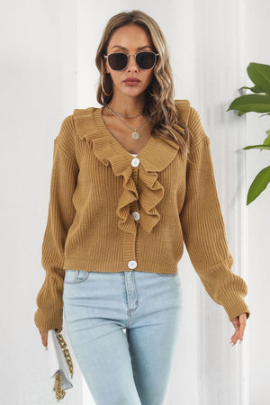 Camel knit cardigan with ruffled collar and button front, styled with jeans.