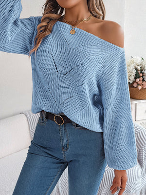Off-the-shoulder Misty Blue knit sweater with openwork detail and long sleeves.