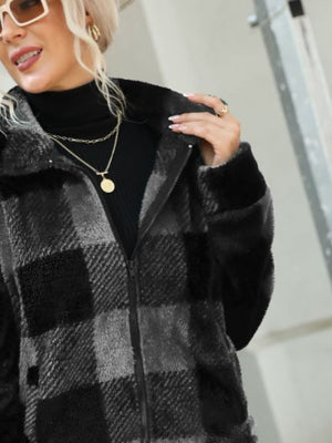 Charcoal plaid sherpa zip-up jacket with collared neckline.