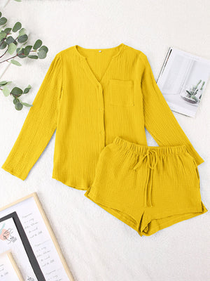 Yellow textured cotton pajama set with button-up top and drawstring shorts