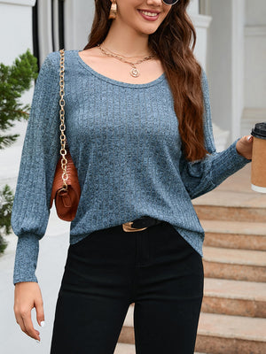 Misty Blue knit sweater with scoop neck and balloon sleeves, ribbed texture.