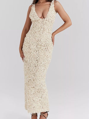 Cream floral applique maxi dress with plunging V-neck and sleeveless design.