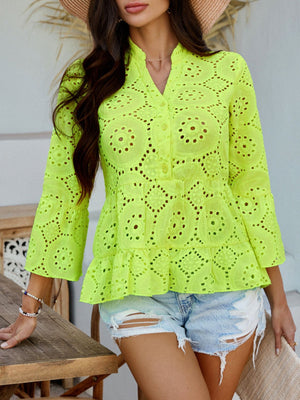 Neon yellow eyelet embroidered peplum blouse with ruffles and buttoned neckline.