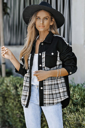 Plaid panel denim shirt jacket in black with button front and chest pockets.