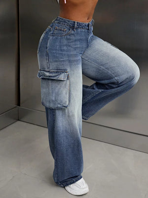 Vintage wide-leg cargo jeans in light wash denim with ombre fading and utility pockets.