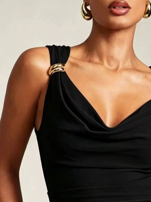 Black cowl neck tank top with draped fabric and gold ring strap details.