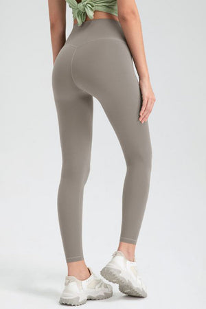 Taupe high rise leggings with seamless back detail and ankle length