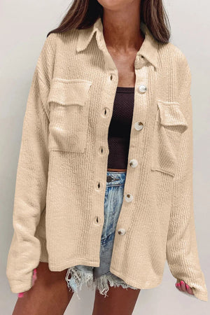 Textured corduroy overshirt in camel with patch pockets and button front.