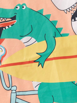 Toddler crew neck t-shirt with a green crocodile surfing on a yellow surfboard.