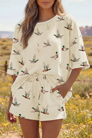 Beige duck print pajama set with crew neck top and drawstring shorts