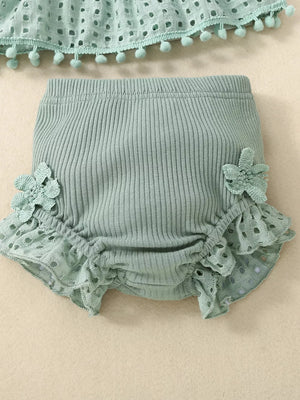 Green cotton baby bloomers with eyelet ruffle trim and floral applique