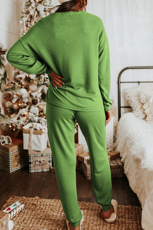 Matcha green loungewear set with crew neck sweatshirt and relaxed fit pants.